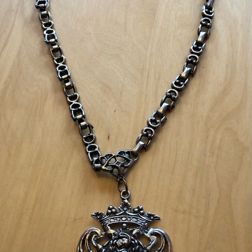 Ornate Silver-Tone Crest Pendant Necklace